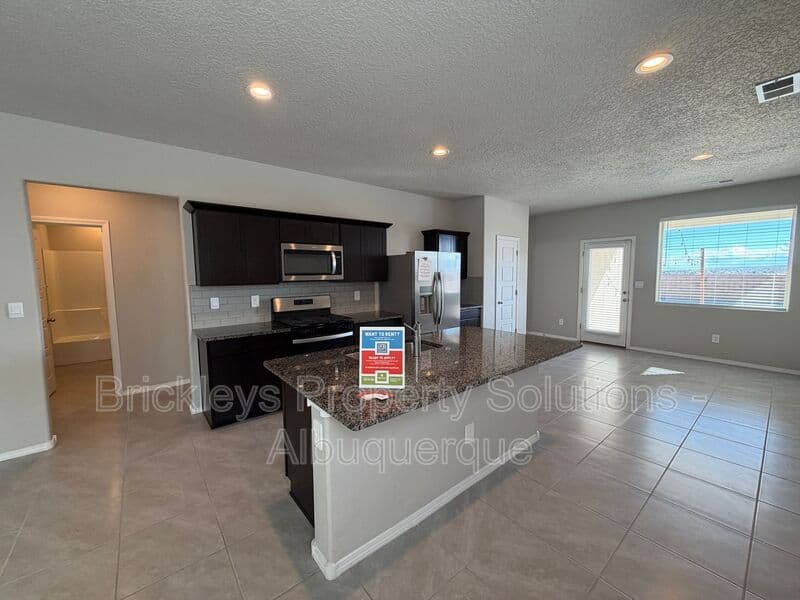 3-bedroom 2-bath home at 614 Turmalina Dr SE for $2,200/mo managed by Brickleys Property Solutions Albuquerque — photo 8 of 29