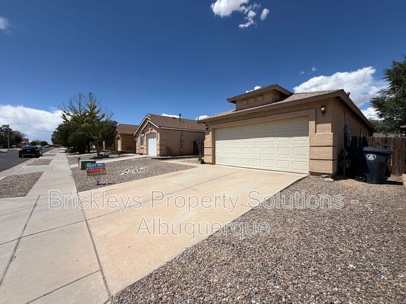3-bedroom 2-bath home at 6019 Full Moon Ave NW for $1,900/mo managed by Brickleys Property Solutions Albuquerque — photo 3 of 26