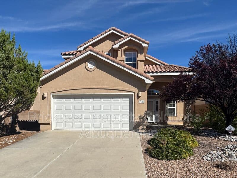 4-bedroom 3-bath home at 7131 Wild Olive Ave NE for $2,900/mo managed by Brickleys Property Solutions Albuquerque — photo 2 of 38