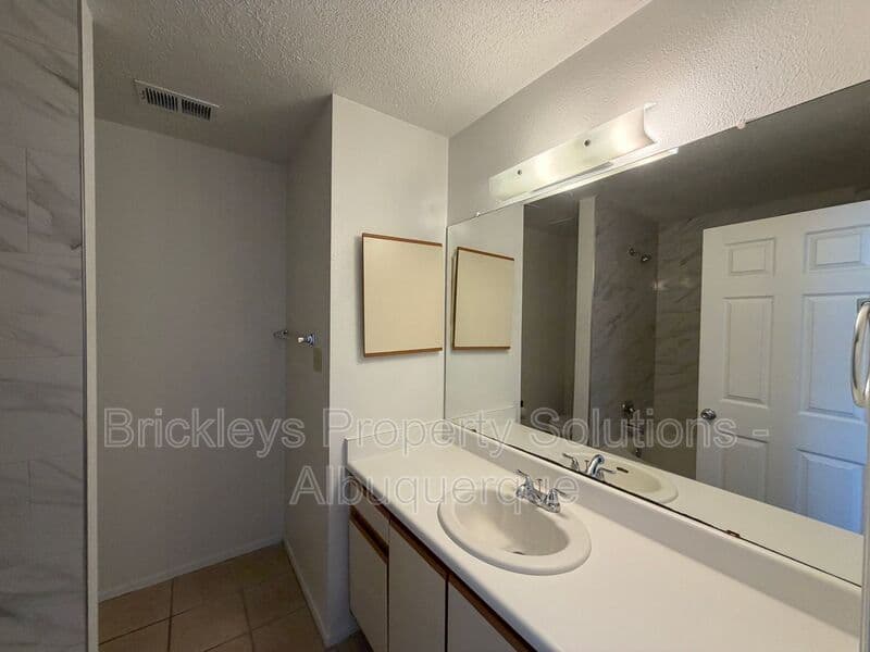 3-bedroom 2-bath home at 4520 Rockaway Loop NE for $1,900/mo managed by Brickleys Property Solutions Albuquerque — photo 20 of 29