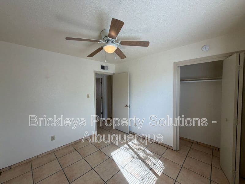 3-bedroom 2-bath home at 9937 Clearwater St. NW for $1,900/mo managed by Brickleys Property Solutions Albuquerque — photo 9 of 27