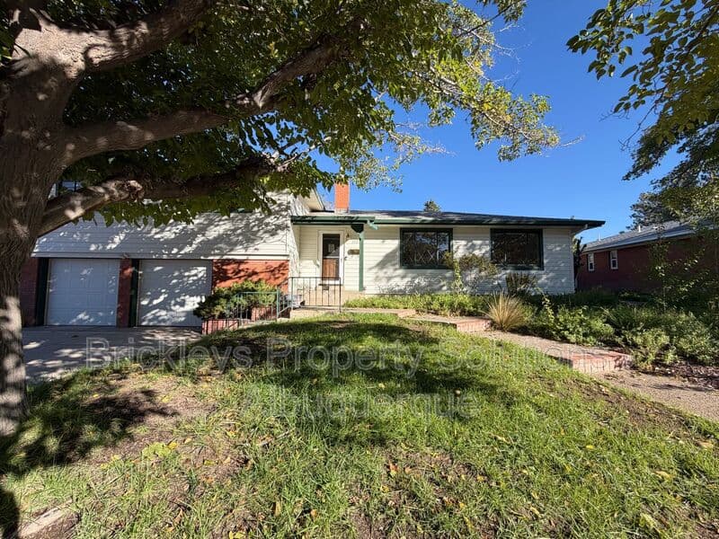 4-bedroom 3-bath home at 7121 Edwina Ave NE for $2,450/mo managed by Brickleys Property Solutions Albuquerque — photo 2 of 47