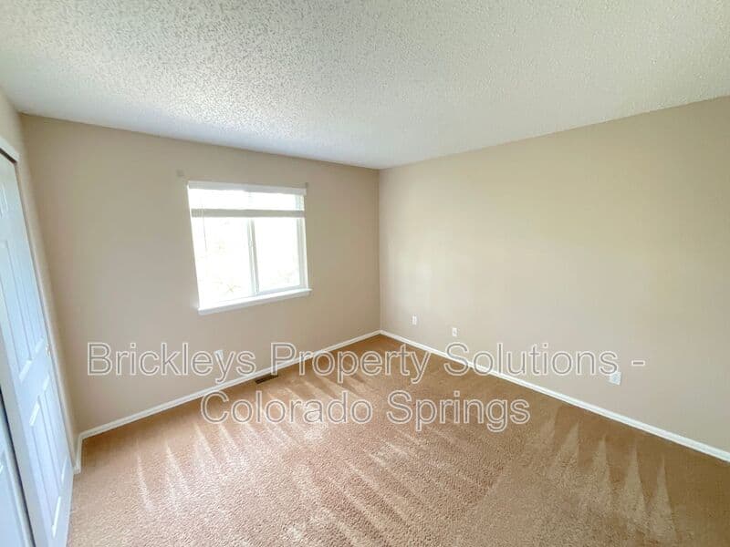 4-bedroom 3.5-bath home at 6160 Jaffee Ct for $2,500/mo managed by Brickleys Property Solutions Colorado Springs — photo 36 of 45