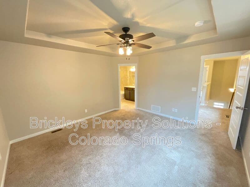 3-bedroom 2.5-bath home at 2401 Ellingwood Dr for $2,233/mo total (includes $2,195 base rent + $38 required Tenant Benefit Package) managed by Brickleys Property Solutions Colorado Springs — photo 28 of 40