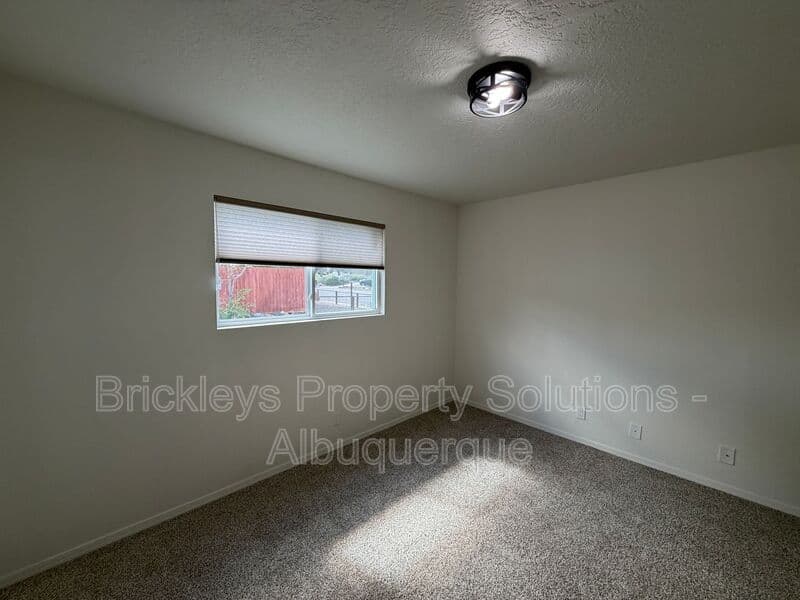 3-bedroom 2-bath home at 5608 Drake Ave NW for $2,100/mo managed by Brickleys Property Solutions Albuquerque — photo 9 of 32