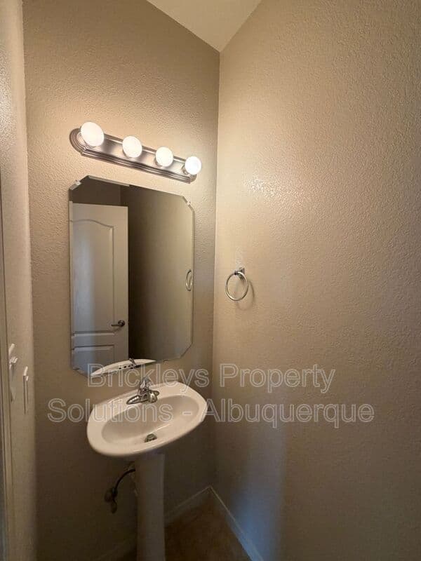 4-bedroom 3.5-bath home at 6228 Nacional Rd NW for $2,700/mo managed by Brickleys Property Solutions Albuquerque — photo 25 of 44