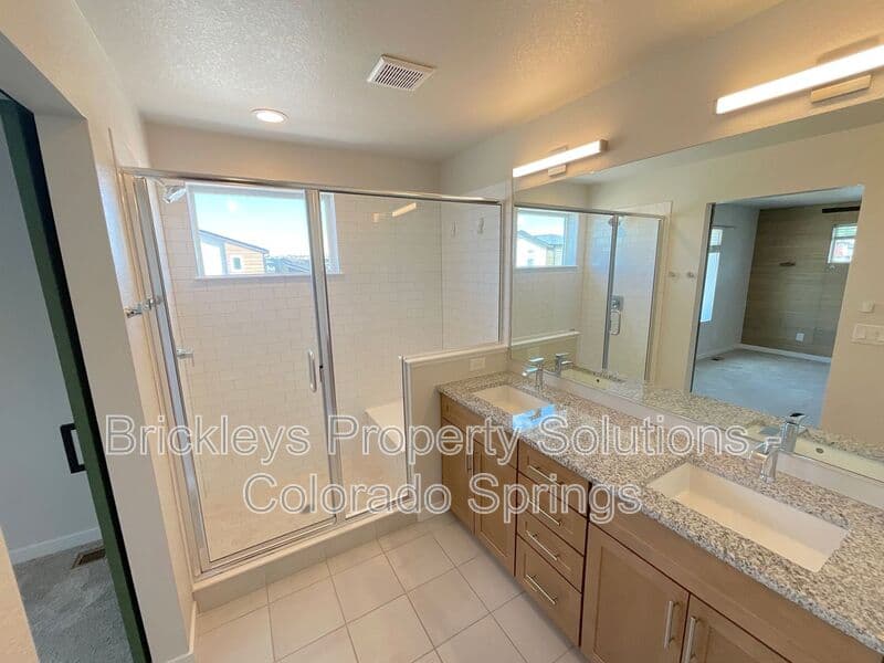 3-bedroom 3.5-bath home at 7343 Rosa Belle Hts for $2,350/mo managed by Brickleys Property Solutions Colorado Springs — photo 25 of 33