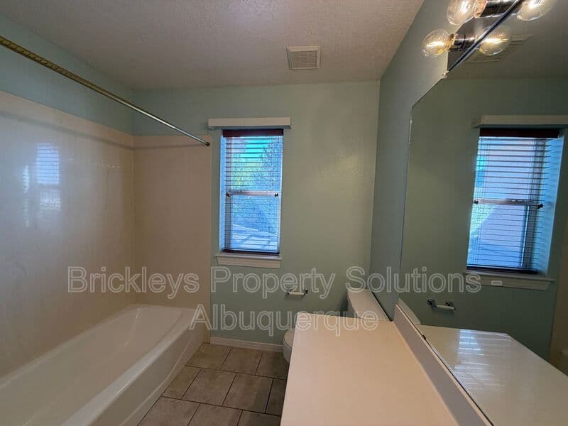 3-bedroom 2.5-bath home at 6517 Glen Oak NE for $2,650/mo managed by Brickleys Property Solutions Albuquerque — photo 12 of 39