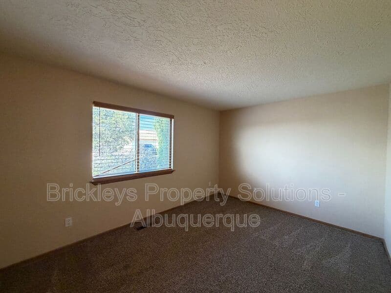 3-bedroom 2-bath home at 12606 Colony Pl NE for $2,250/mo managed by Brickleys Property Solutions Albuquerque — photo 25 of 32