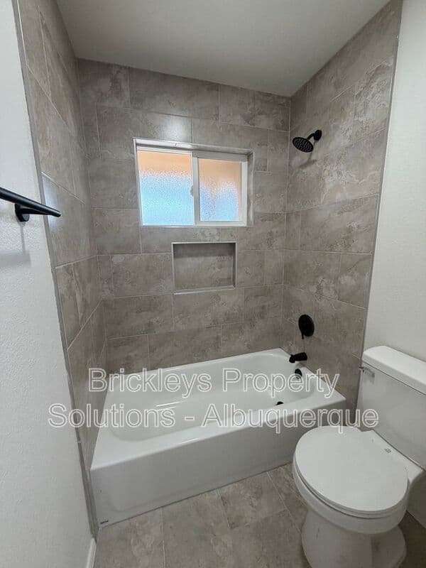 3-bedroom 2-bath home at 5608 Drake Ave NW for $2,100/mo managed by Brickleys Property Solutions Albuquerque — photo 8 of 32