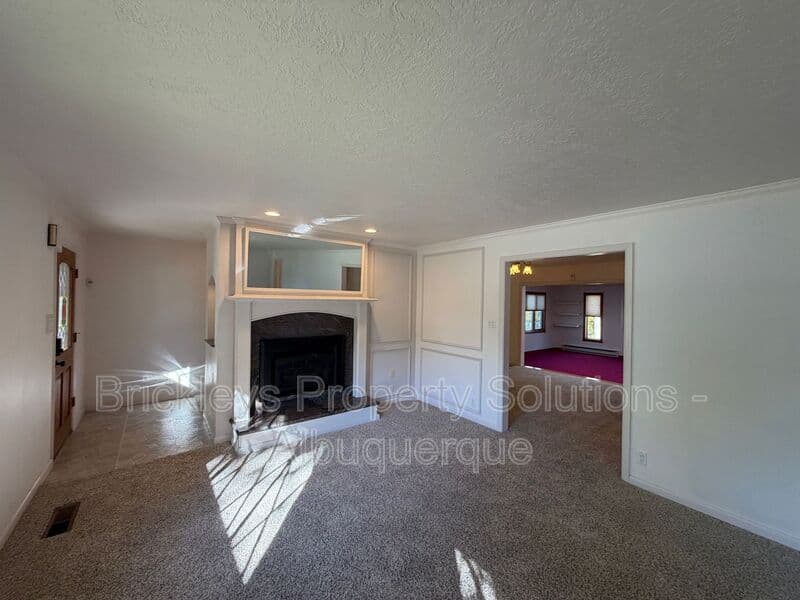 4-bedroom 3-bath home at 7121 Edwina Ave NE for $2,450/mo managed by Brickleys Property Solutions Albuquerque — photo 6 of 47