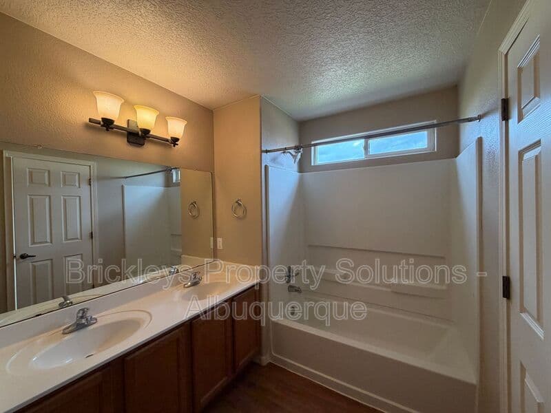 4-bedroom 3-bath home at 1904 Busher St. SE for $2,450/mo managed by Brickleys Property Solutions Albuquerque — photo 18 of 50