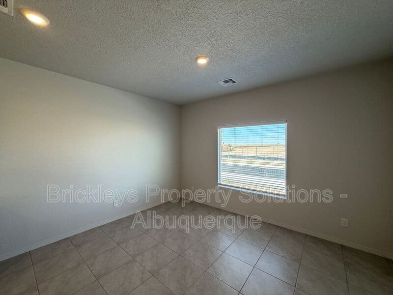 3-bedroom 3-bath home at 6118 Chicago Dr SE for $2,350/mo managed by Brickleys Property Solutions Albuquerque — photo 6 of 42
