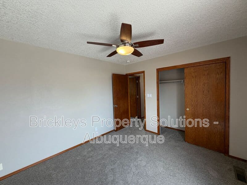 4-bedroom 2.5-bath home at 10331 Dunbar St NW for $2,300/mo managed by Brickleys Property Solutions Albuquerque — photo 15 of 43