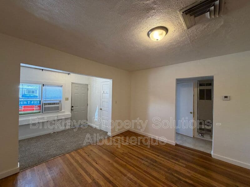 4-bedroom 2-bath home at 313 Cornell Drive SE Unit A for $1,600/mo managed by Brickleys Property Solutions Albuquerque — photo 9 of 27
