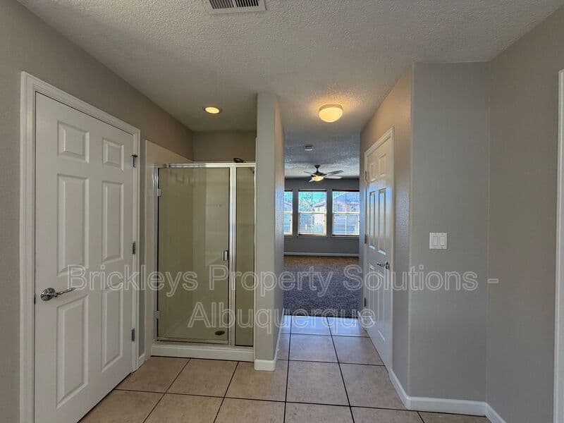 3-bedroom 2.5-bath home at 418 Paseo Roja Pl NE for $2,375/mo managed by Brickleys Property Solutions Albuquerque — photo 23 of 42
