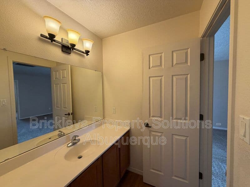 4-bedroom 3-bath home at 1904 Busher St. SE for $2,450/mo managed by Brickleys Property Solutions Albuquerque — photo 25 of 50