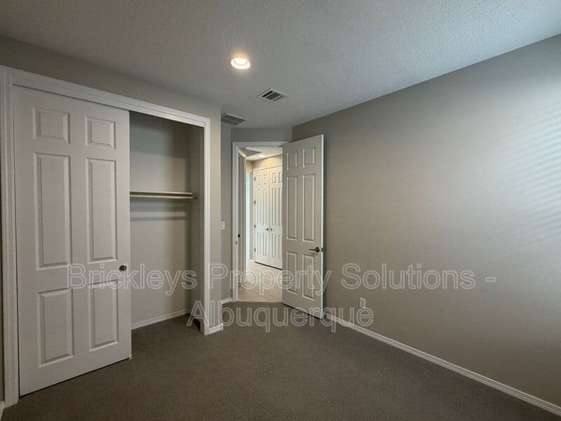 3-bedroom 2-bath home at 938 Lazuli Rd SE for $2,475/mo managed by Brickleys Property Solutions Albuquerque — photo 31 of 36
