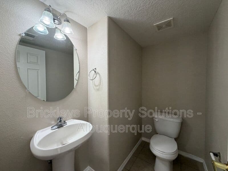 5-bedroom 4.5-bath home at 7008 Tree Line Ave NW for $2,500/mo managed by Brickleys Property Solutions Albuquerque — photo 27 of 43