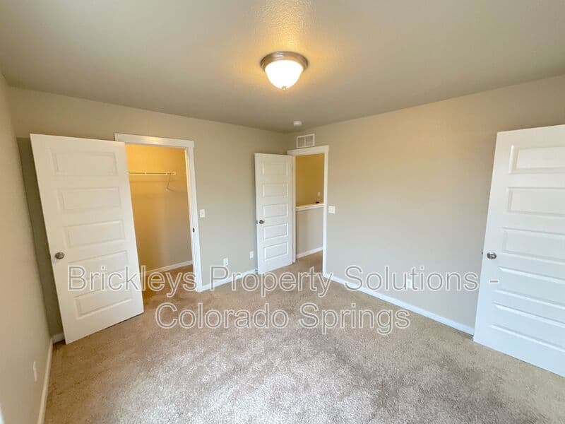3-bedroom 2.5-bath home at 2401 Ellingwood Dr for $2,233/mo total (includes $2,195 base rent + $38 required Tenant Benefit Package) managed by Brickleys Property Solutions Colorado Springs — photo 33 of 40