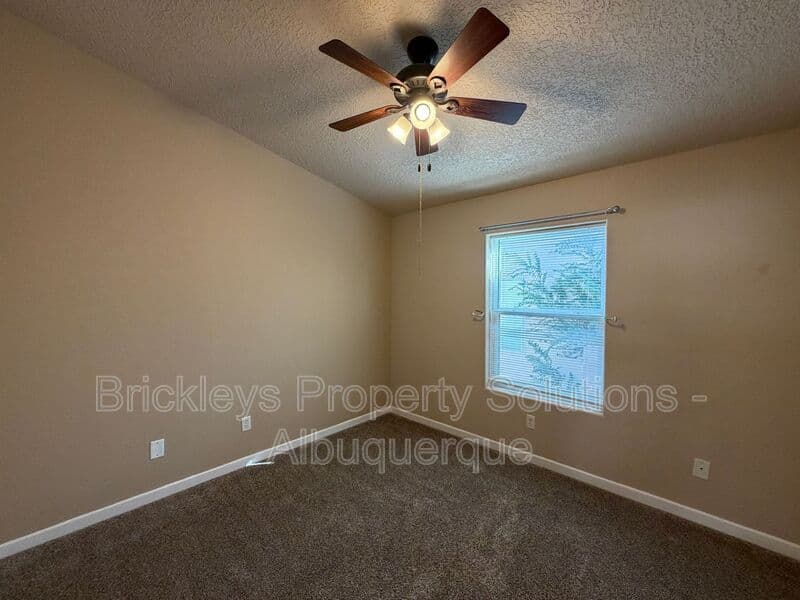 3-bedroom 2-bath home at 1548 Reynosa Loop SE for $1,900/mo managed by Brickleys Property Solutions Albuquerque — photo 24 of 31