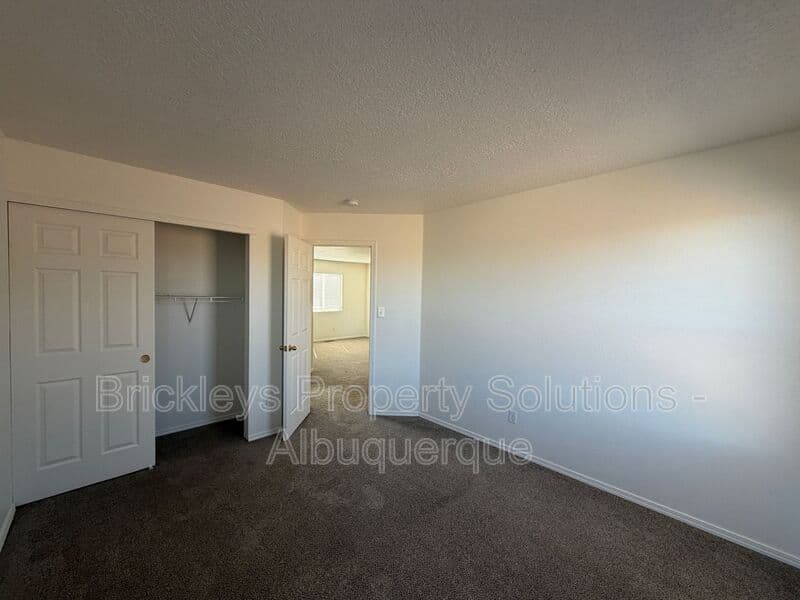 4-bedroom 3-bath home at 6027 Park South Pl NW for $2,400/mo managed by Brickleys Property Solutions Albuquerque — photo 31 of 36