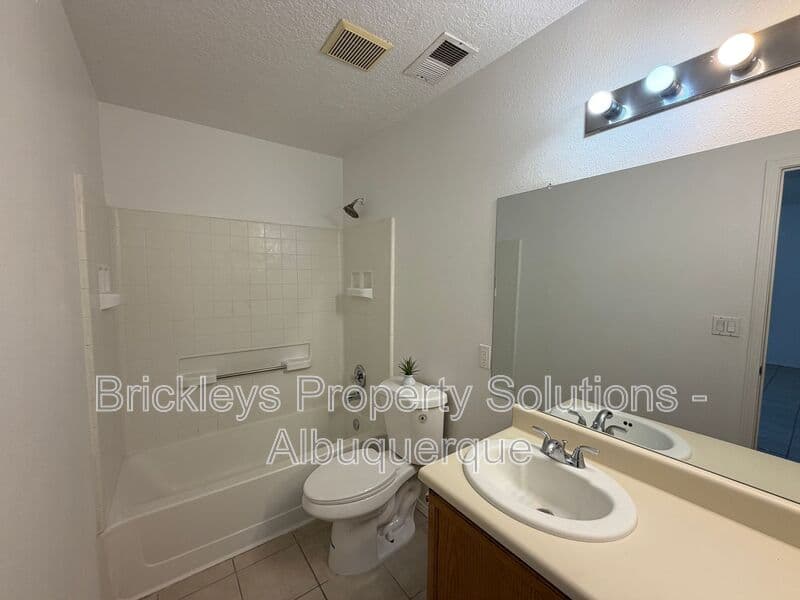 3-bedroom 2-bath home at 1405 Secret Valley Drive SW for $1,800/mo managed by Brickleys Property Solutions Albuquerque — photo 16 of 34