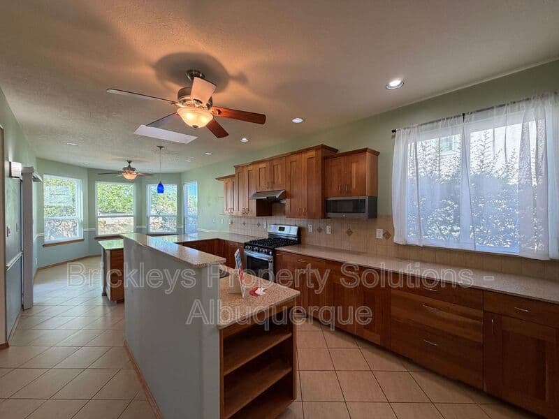 3-bedroom 2.5-bath home at 9600 Allande Rd NE for $3,200/mo managed by Brickleys Property Solutions Albuquerque — photo 18 of 40