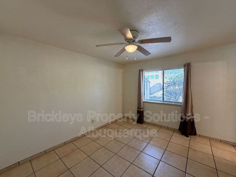 3-bedroom 2-bath home at 9937 Clearwater St. NW for $1,900/mo managed by Brickleys Property Solutions Albuquerque — photo 10 of 27