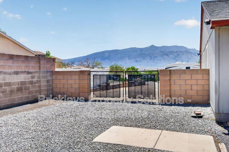 4-bedroom 2-bath home at 2413 Agua Fria Dr NE for $2,275/mo managed by Brickleys Property Solutions Albuquerque — photo 14 of 42