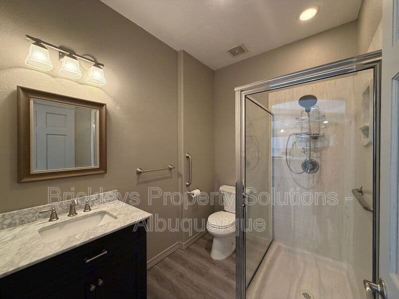 3-bedroom 2-bath home at 6812 Nagoya Rd NE for $2,700/mo managed by Brickleys Property Solutions Albuquerque — photo 11 of 43