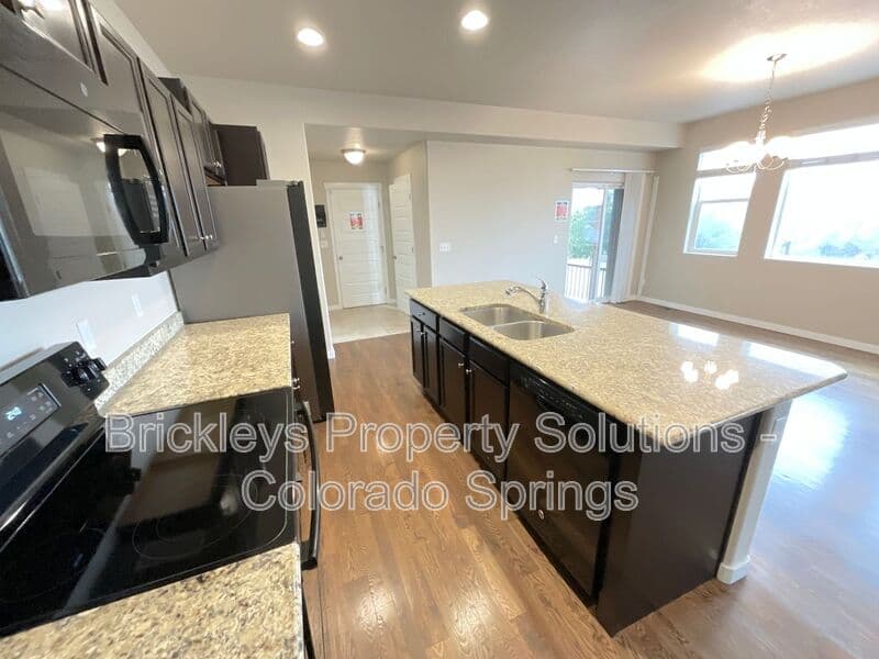 3-bedroom 2.5-bath home at 2401 Ellingwood Dr for $2,233/mo total (includes $2,195 base rent + $38 required Tenant Benefit Package) managed by Brickleys Property Solutions Colorado Springs — photo 17 of 40