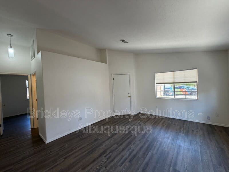 3-bedroom 2-bath home at 6019 Full Moon Ave NW for $1,900/mo managed by Brickleys Property Solutions Albuquerque — photo 5 of 26