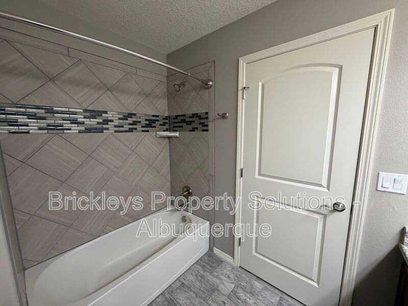 4-bedroom 3-bath home at 860 Fire Wheel Loop for $2,300/mo managed by Brickleys Property Solutions Albuquerque — photo 9 of 40
