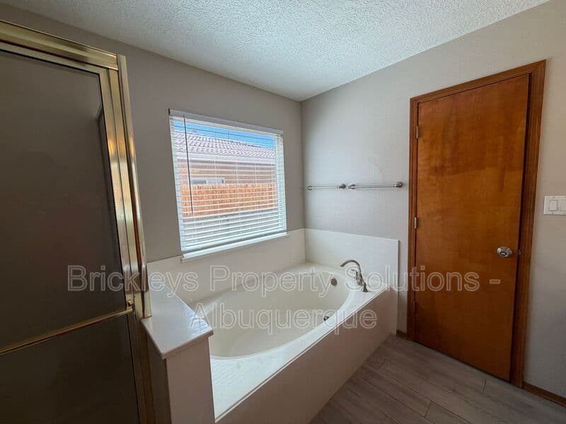 4-bedroom 2.5-bath home at 10331 Dunbar St NW for $2,300/mo managed by Brickleys Property Solutions Albuquerque — photo 34 of 43