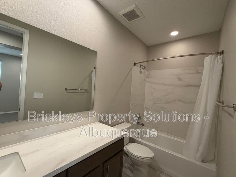 3-bedroom 2-bath home at 938 Lazuli Rd SE for $2,475/mo managed by Brickleys Property Solutions Albuquerque — photo 24 of 36