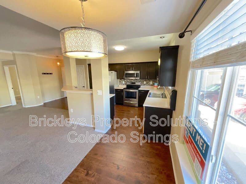 3-bedroom 2-bath home at 3780 Riviera Grove Unit #104 for $1,863/mo total (includes $1,825 base rent + $38 required Tenant Benefit Package) managed by Brickleys Property Solutions Colorado Springs — photo 10 of 24