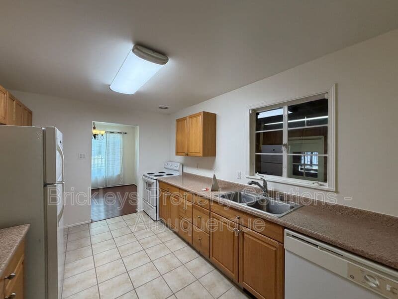3-bedroom 2-bath home at 4712 Palo Duro Ave. NE for $1,750/mo managed by Brickleys Property Solutions Albuquerque — photo 10 of 38