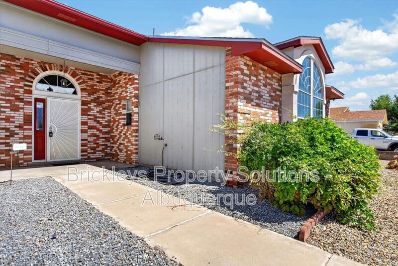 4-bedroom 2-bath home at 2413 Agua Fria Dr NE for $2,275/mo managed by Brickleys Property Solutions Albuquerque — photo 4 of 42