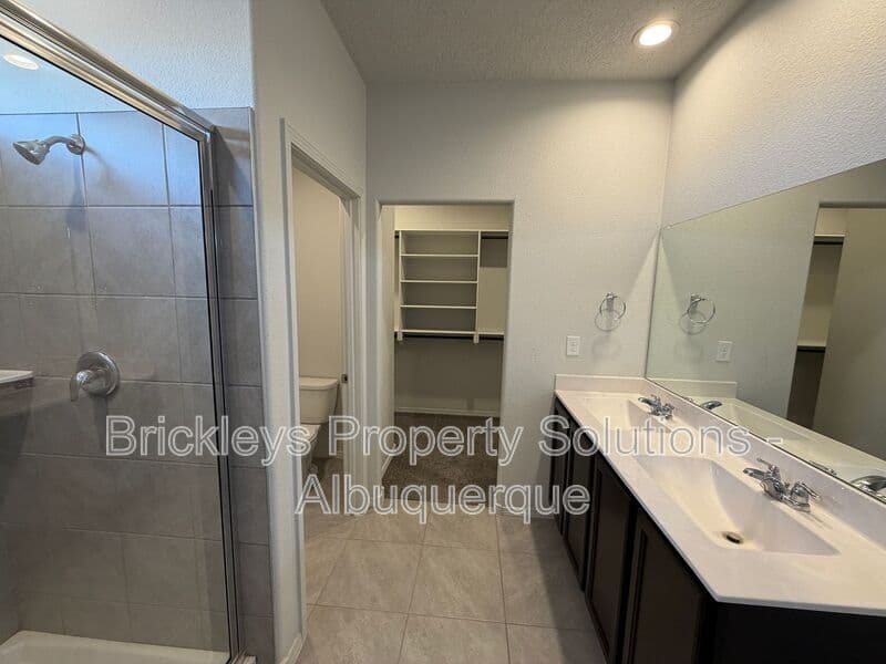 3-bedroom 2-bath home at 1504 Alto Colores for $2,100/mo managed by Brickleys Property Solutions Albuquerque — photo 13 of 30