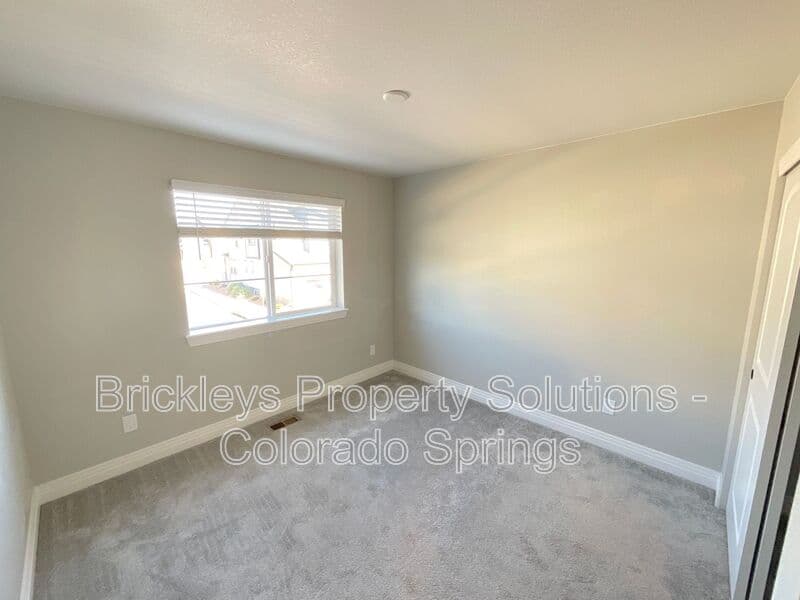 3-bedroom 2.5-bath home at 1721 Rose Quartz Hts for $2,300/mo managed by Brickleys Property Solutions Colorado Springs — photo 22 of 28
