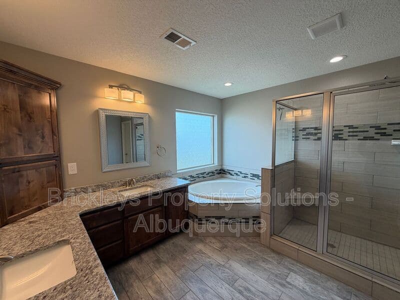 4-bedroom 3-bath home at 860 Fire Wheel Loop for $2,300/mo managed by Brickleys Property Solutions Albuquerque — photo 21 of 40