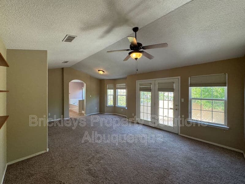 4-bedroom 3-bath home at 7131 Wild Olive Ave NE for $2,900/mo managed by Brickleys Property Solutions Albuquerque — photo 27 of 38