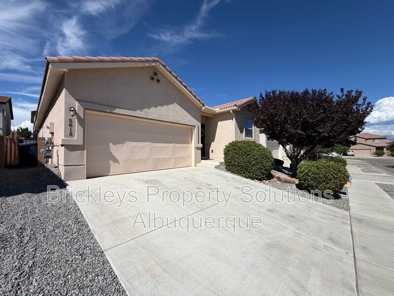 3-bedroom 2-bath home at 5815 Mafraq Ave NW for $2,150/mo managed by Brickleys Property Solutions Albuquerque — photo 3 of 32