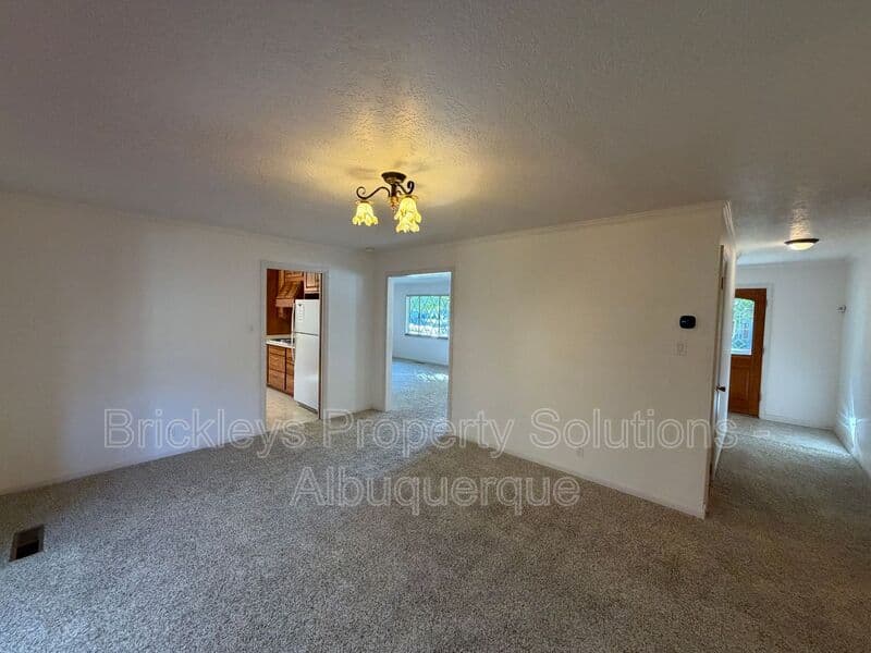 4-bedroom 3-bath home at 7121 Edwina Ave NE for $2,450/mo managed by Brickleys Property Solutions Albuquerque — photo 15 of 47