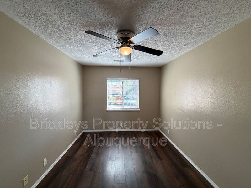 3-bedroom 2.5-bath home at 10527 Brookline Pl NW for $2,300/mo managed by Brickleys Property Solutions Albuquerque — photo 5 of 40