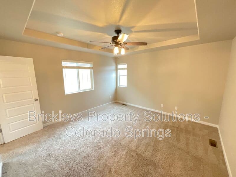 3-bedroom 2.5-bath home at 2401 Ellingwood Dr for $2,233/mo total (includes $2,195 base rent + $38 required Tenant Benefit Package) managed by Brickleys Property Solutions Colorado Springs — photo 27 of 40