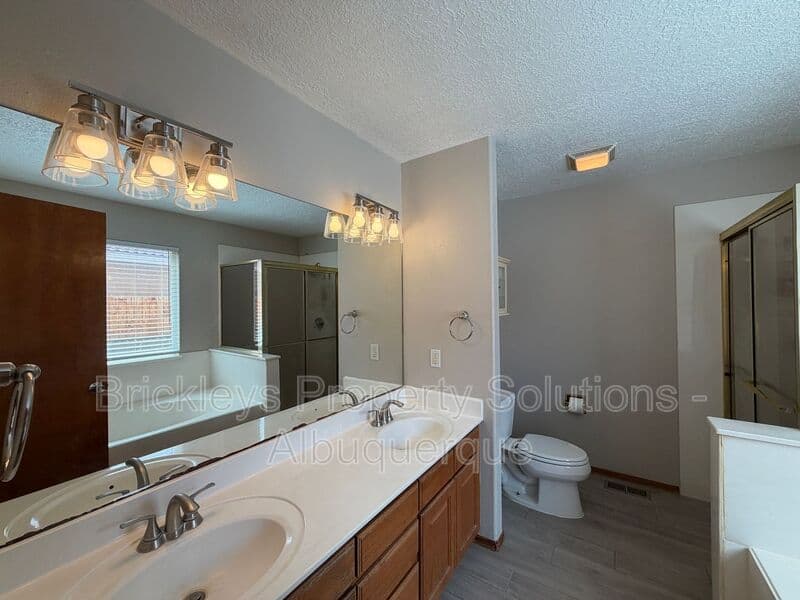 4-bedroom 2.5-bath home at 10331 Dunbar St NW for $2,300/mo managed by Brickleys Property Solutions Albuquerque — photo 33 of 43