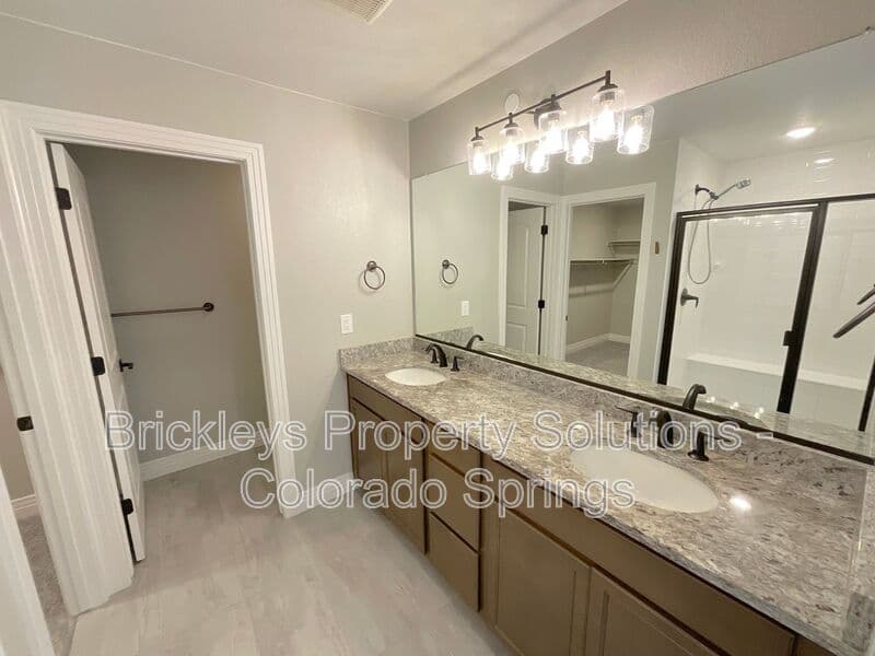 3-bedroom 2.5-bath home at 1721 Rose Quartz Hts for $2,300/mo managed by Brickleys Property Solutions Colorado Springs — photo 18 of 28
