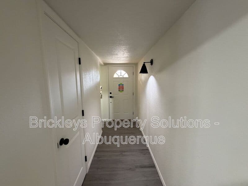 3-bedroom 2-bath home at 5608 Drake Ave NW for $2,100/mo managed by Brickleys Property Solutions Albuquerque — photo 5 of 32
